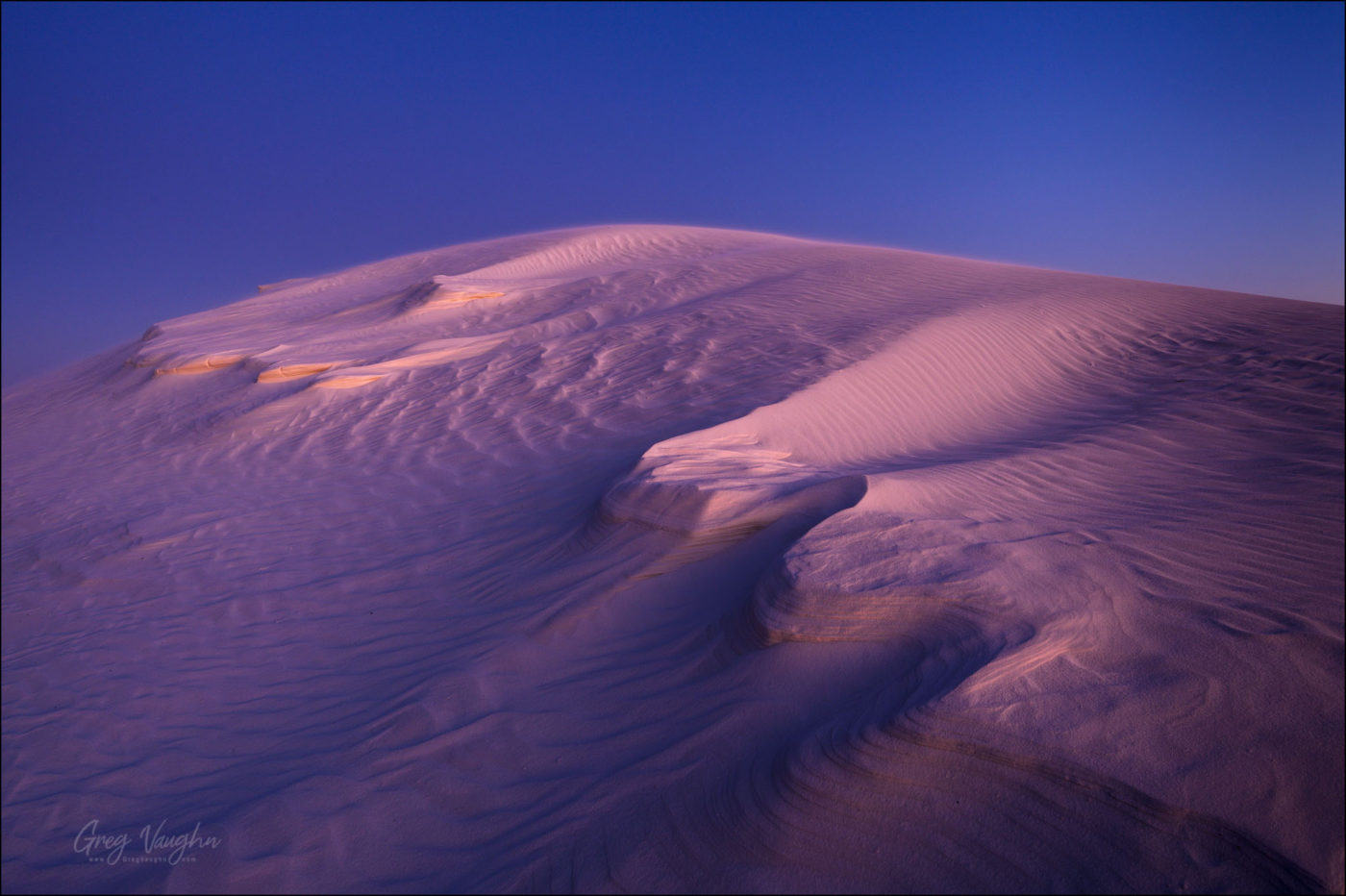Sand dune at dusk; White Sands National Monument, New Mexico, USA.